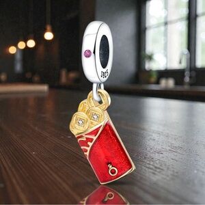 Red and Gold Charm with Silver Accents